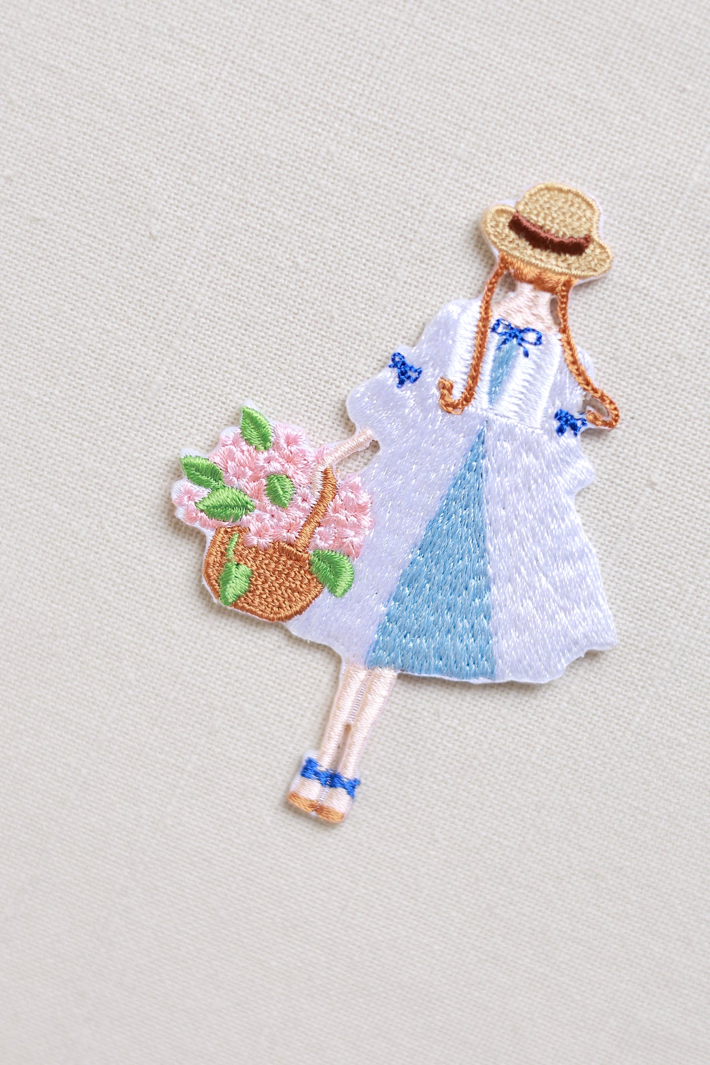 The Blossom-holding girl